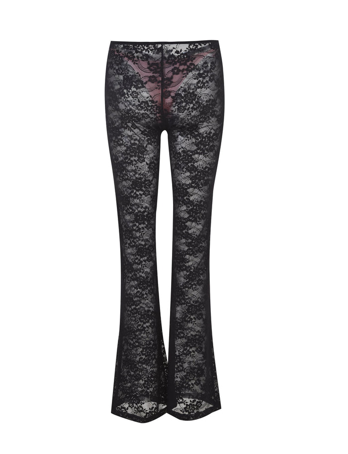 A pair of TIGERMIST MELANIE PANT in black lace is shown on a white background. These pants have a fitted waist and flare slightly at the bottom, creating a bell-bottom silhouette. The semi-transparent lace features a floral pattern throughout.