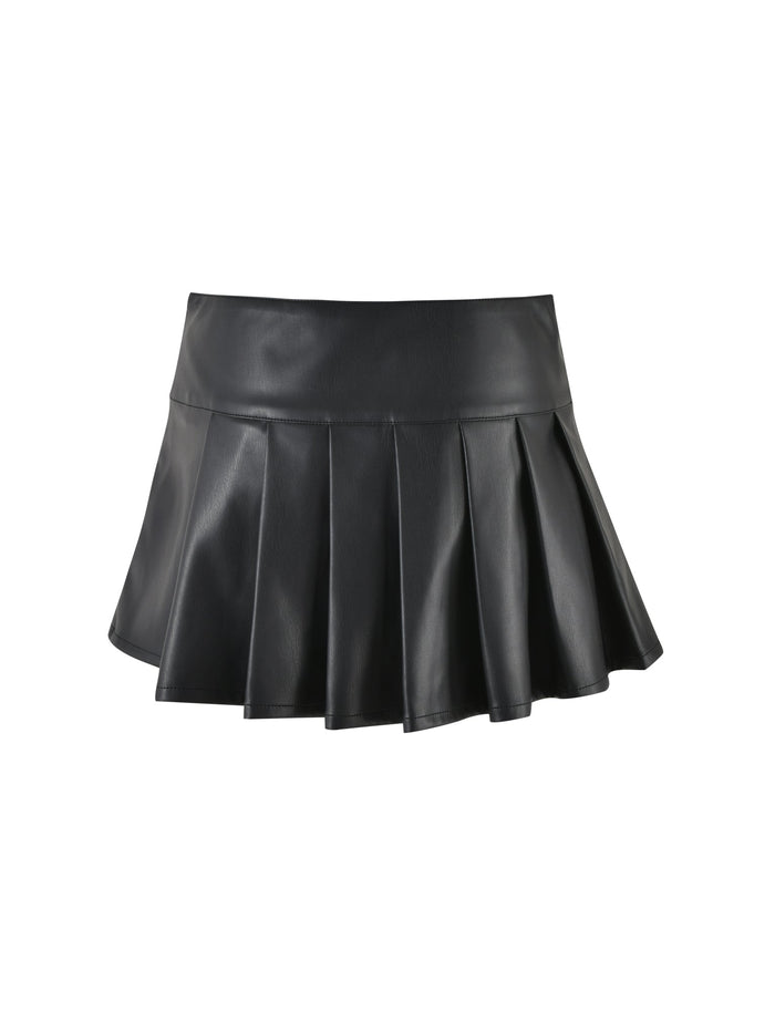 The TIGERMIST MERRI SKIRT - BLACK : BLACK PU is a short pleated black leather skirt that stands out against a white background. It features a wide waistband and evenly spaced pleats that flare out, creating a structured and stylish look.