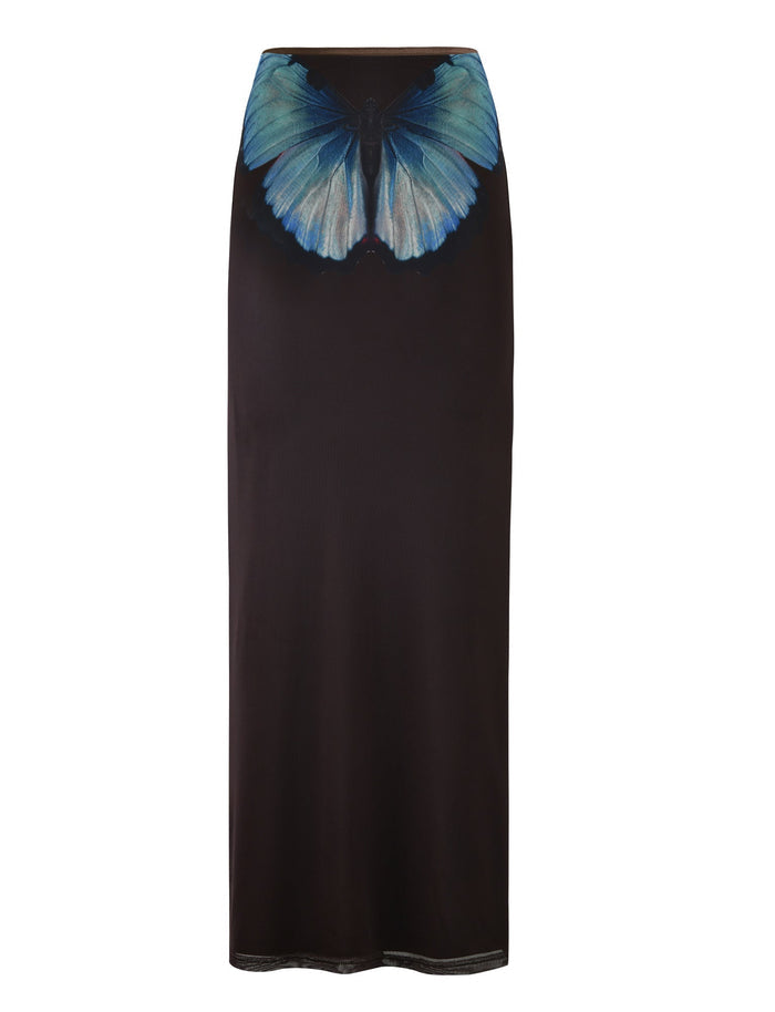 Introducing the NANCI SKIRT by TIGERMIST, a sleek brown skirt adorned with a large, detailed blue butterfly design at the waistband. This striking feature creates an eye-catching contrast against the rich dark fabric, perfectly complementing its straight and sophisticated silhouette.
