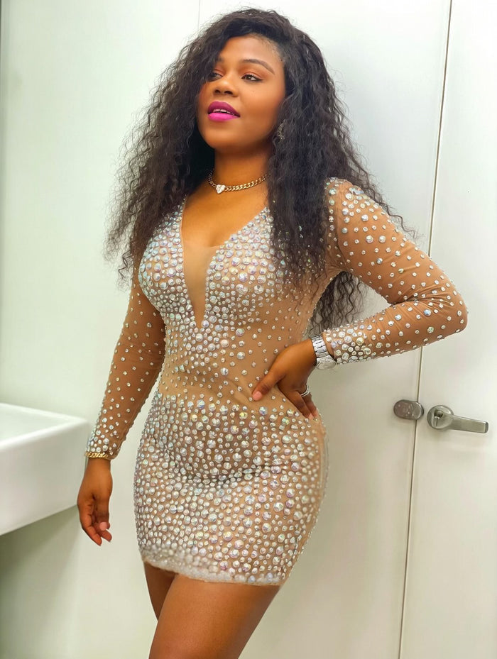 Nude illusion rhinestone mesh mini dress with deep neckline and bodycon fit