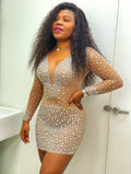 Nude illusion rhinestone mesh mini dress with deep neckline and bodycon fit