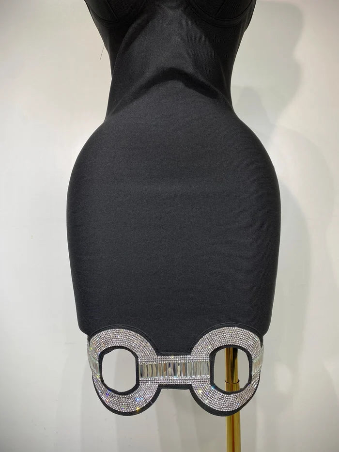 Patricia backless halter black midi bandage dress for women. Elegant bodycon outfit for cocktails, parties, and evening events.