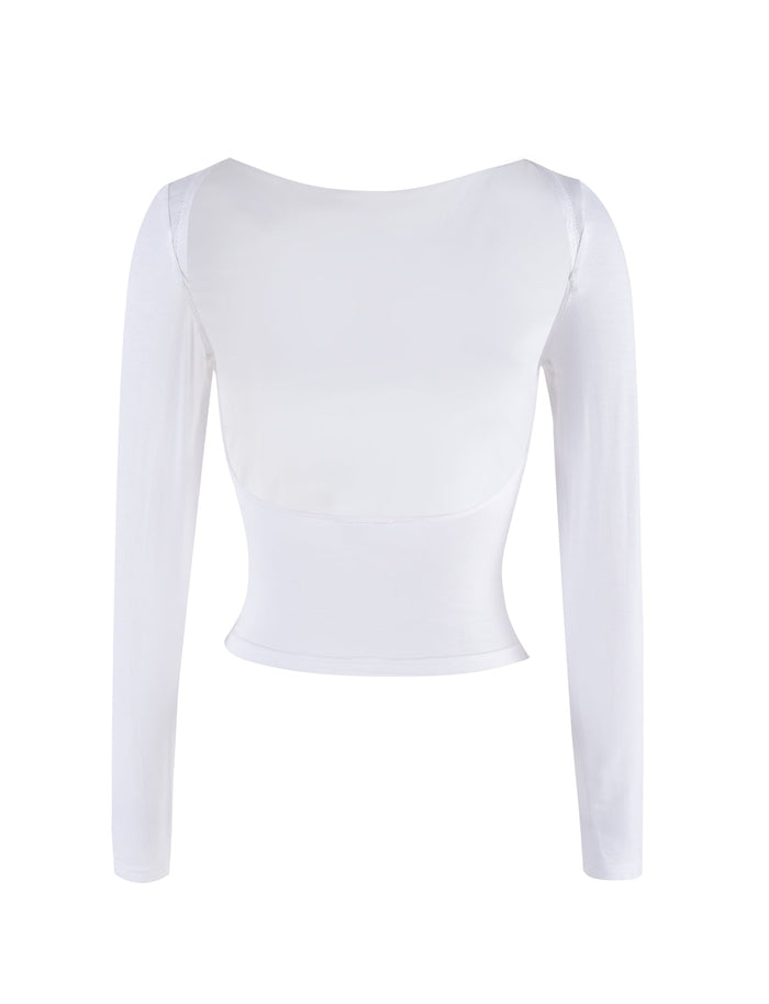 Introducing the QUINNELL TOP - WHITE by TIGERMIST, a white long-sleeve crop top with a fitted design featuring a slightly scooped back neckline. The fabric is smooth and stretchy, ensuring both comfort and style.