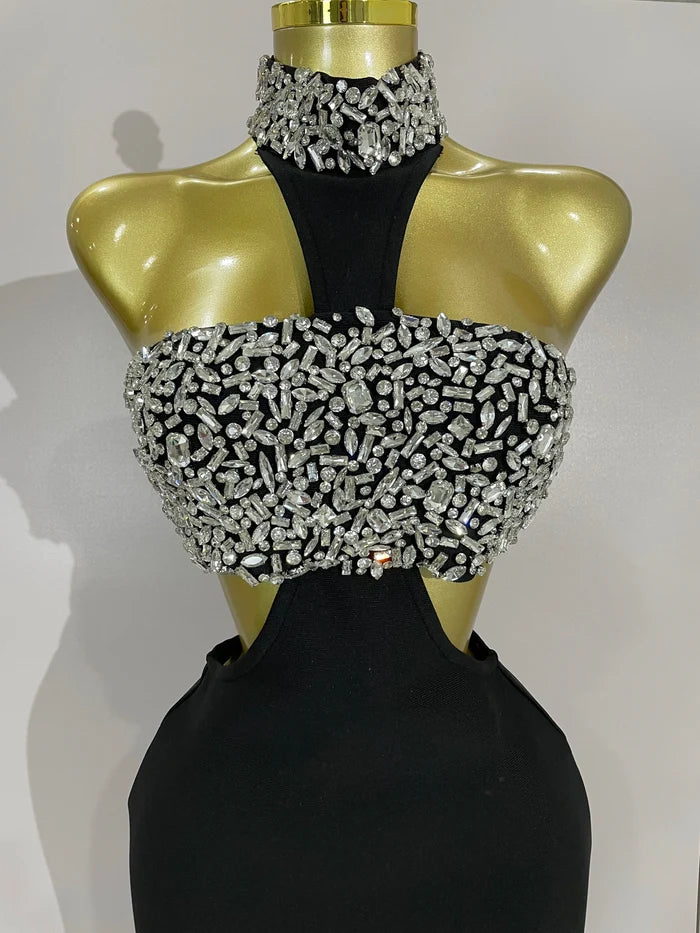 Shine in the Rhian black crystal rhinestone backless bodycon bandage dress. Elegant party dress for birthdays, cocktails, and evening events.