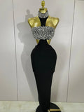 Shine in the Rhian black crystal rhinestone backless bodycon bandage dress. Elegant party dress for birthdays, cocktails, and evening events.