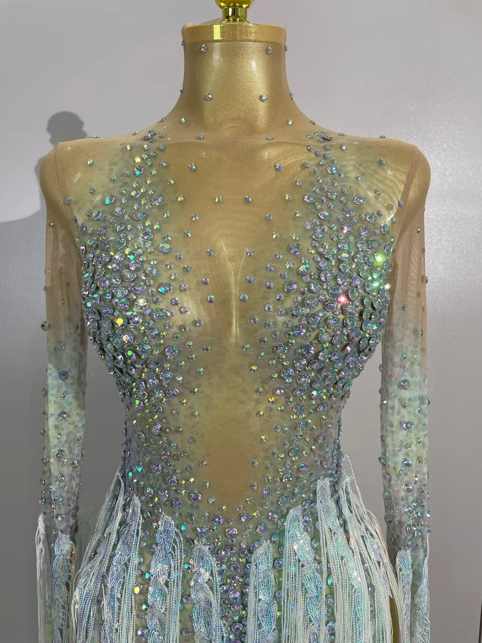 Riza rhinestone tassel long sleeve mesh mini dress for women. Sexy party outfit for Latin dance, nightclub, and club events.
