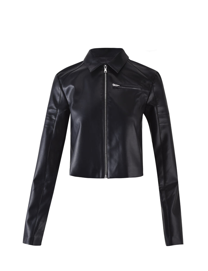 The RYDER JACKET - BLACK by TIGERMIST features a stylish faux leather design with long sleeves and a front zipper closure. It includes a small zippered chest pocket on the left side and a pointed collar, perfectly combining style and functionality.