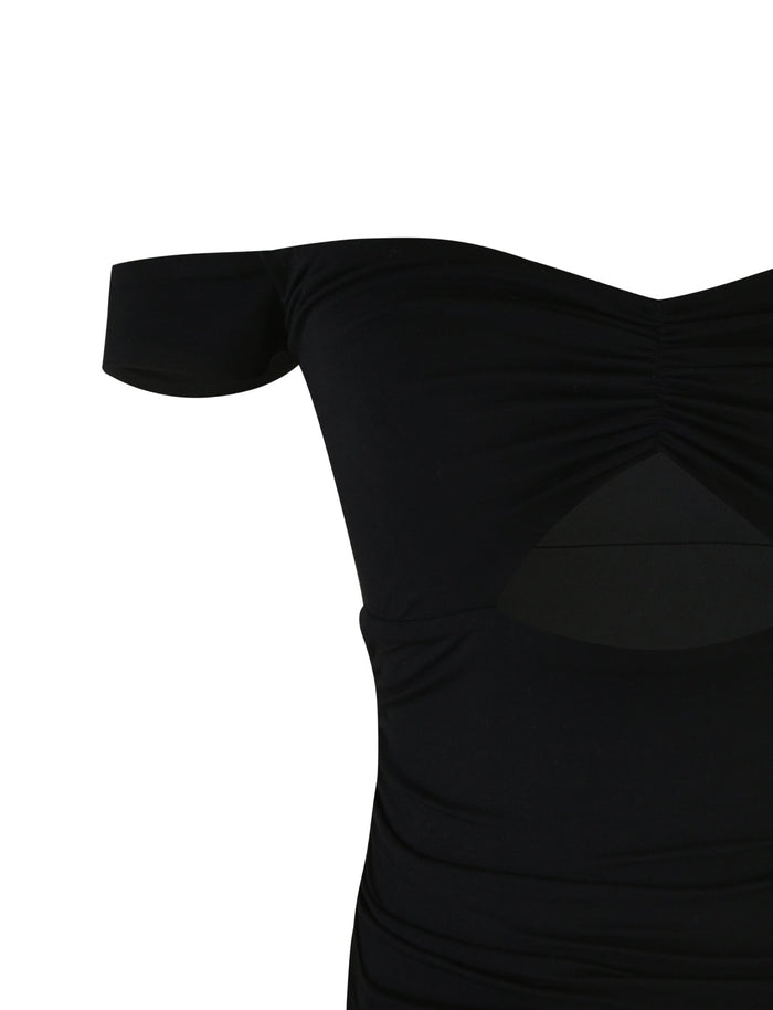 A close-up of the SAFAA TOP in black by TIGERMIST on a white background. The top features ruched detailing at the bust and a cut-out design just below the chest area. The fabric appears to be form-fitting and smooth.