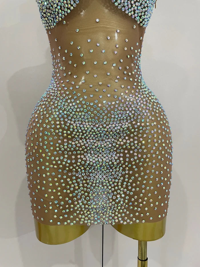 Sasha one shoulder rhinestone mesh sheer mini dress for women. Sexy party outfit for birthdays, nightlife, and stage wear.