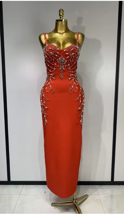 Sasha black bandage maxi dress with a deep V-neckline and hand-sewn black beadwork in a bodycon long silhouette.