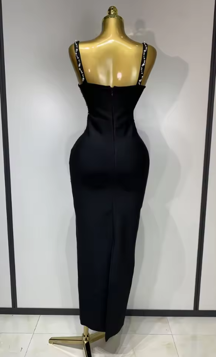 Sasha black bandage maxi dress with a deep V-neckline and hand-sewn black beadwork in a bodycon long silhouette.