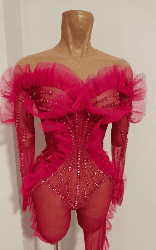 Sexy sparkly rhinestone see-through jumpsuit with long sleeves and fitted mesh design. Perfect for parties, nightlife, and glam evening looks.