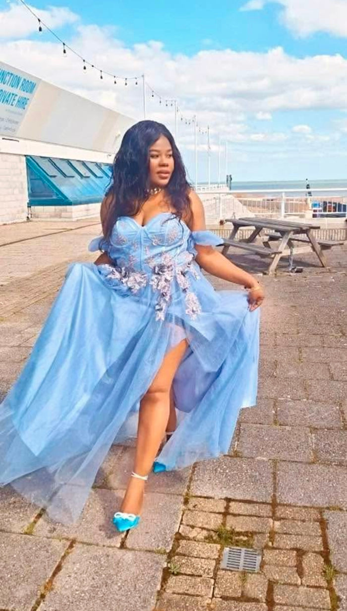 Sky blue off-shoulder floral appliqué tulle dress with flowing skirt and soft elegant silhouette