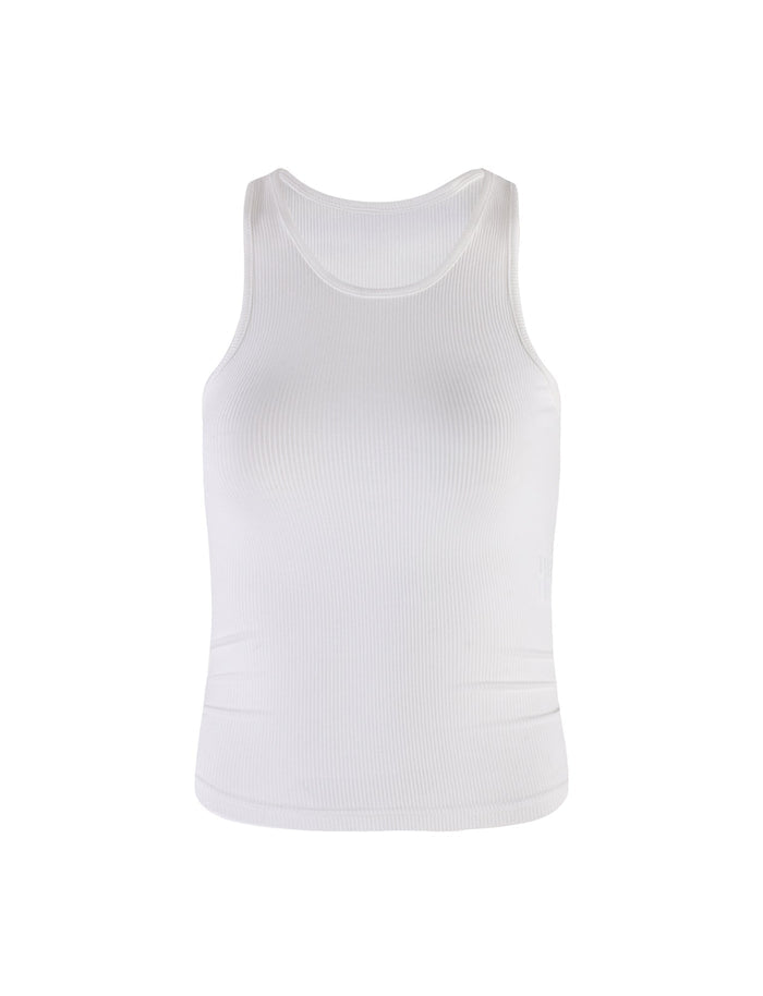 The SOMMER TANK from TIGERMIST is a plain white ribbed tank top featuring a round neckline and a sleeveless design, showcased against a white background. The fabric features a textured pattern, enhancing its casual and versatile appeal.