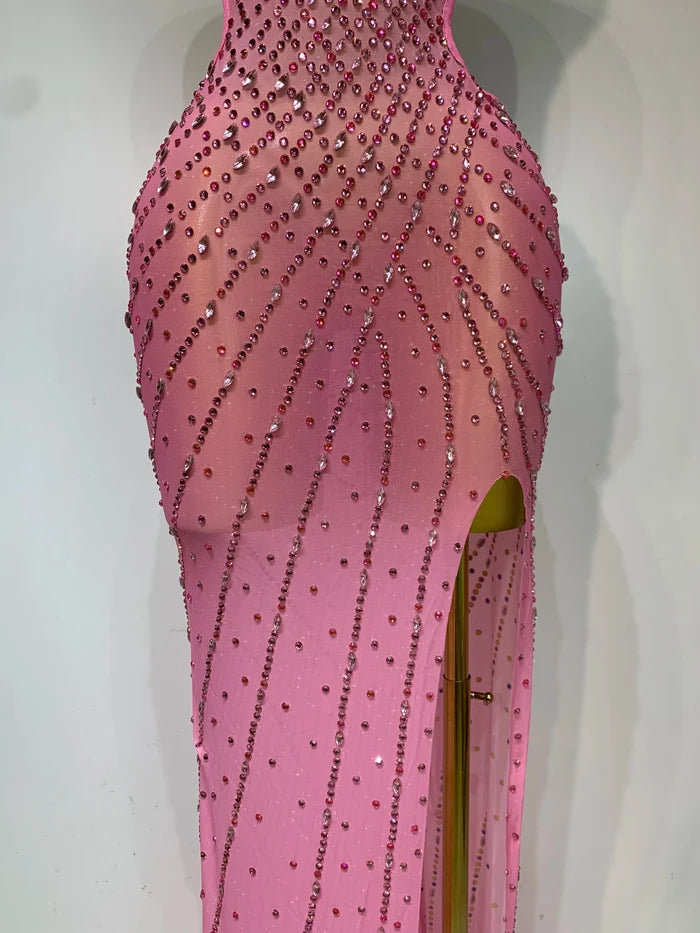 Shine in this rhinestone halter mesh split maxi dress. Sexy backless party dress for birthdays, stage shows, cocktail parties, and evening events.