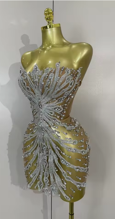 Tamara strapless see-through mini dress encrusted with shining diamonds and crystals for a luxury party look.