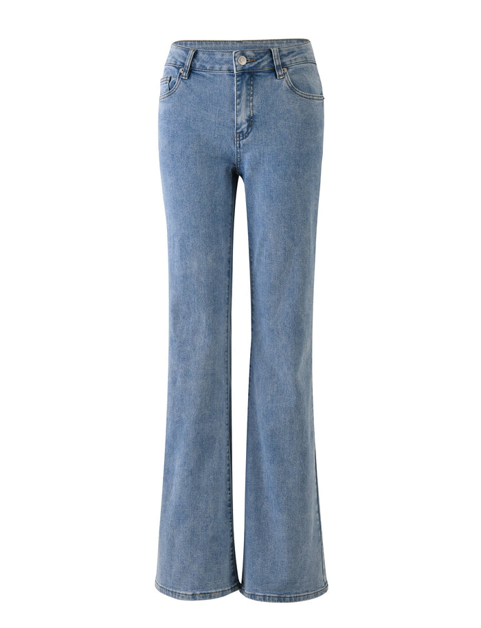 A pair of TATYANA JEANS - BLUE: LIGHT WASH : LIGHT DENIM from TIGERMIST with a high waist and flared legs, displayed against a plain white background. The jeans feature classic five-pocket styling, belt loops, and a button and zipper closure.