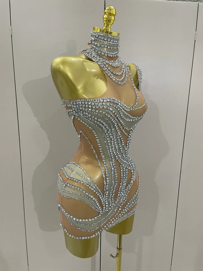 Toni crystal see through stretch mini dress for women. Sparkly party outfit for birthdays, stage wear, and nightlife events.