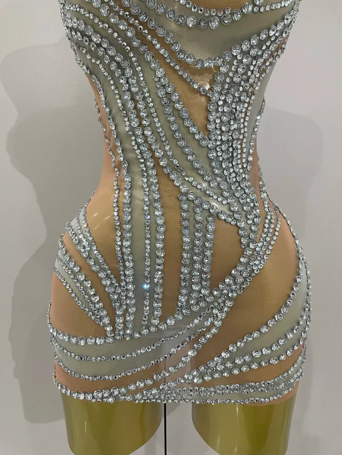 Toni crystal see through stretch mini dress for women. Sparkly party outfit for birthdays, stage wear, and nightlife events.
