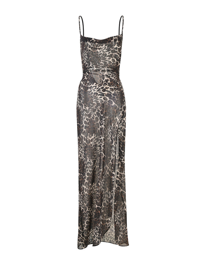 The TYNE DRESS - MULTI : LEOPARD by TIGERMIST is a sleeveless, floor-length dress featuring thin straps and a leopard print pattern. This stylish piece offers a form-fitting bodice with slight draping and a subtle flare towards the hem, showcased in various shades of brown and black.