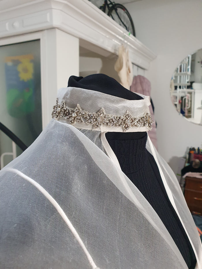 VC9: Silk organza veil cape with crystal details at neck and arm holes