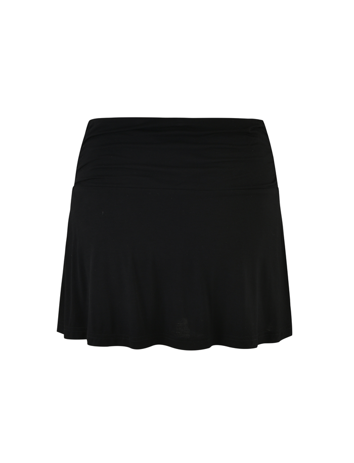 The VERITY SKORT - BLACK by TIGERMIST is a black, knee-length A-line skort with a wide waistband, crafted from soft jersey fabric and shown on a plain white background.