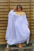 White flowing kaftan abaya with gold neckline detail