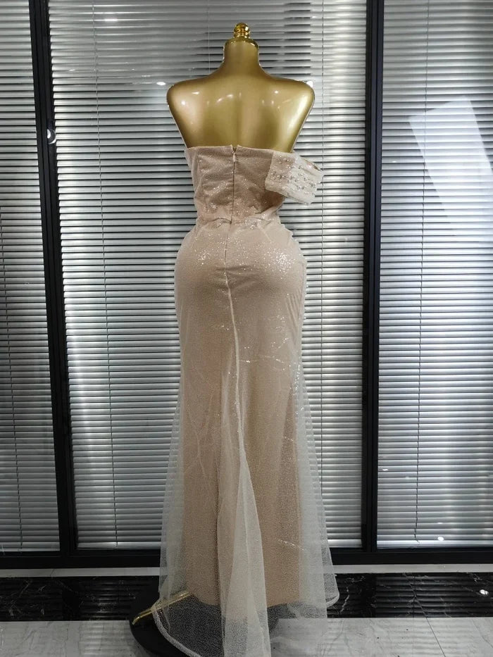 Yvonne strapless sequin beaded mermaid gown for women. Elegant bodycon dress for parties, weddings, and evening events.