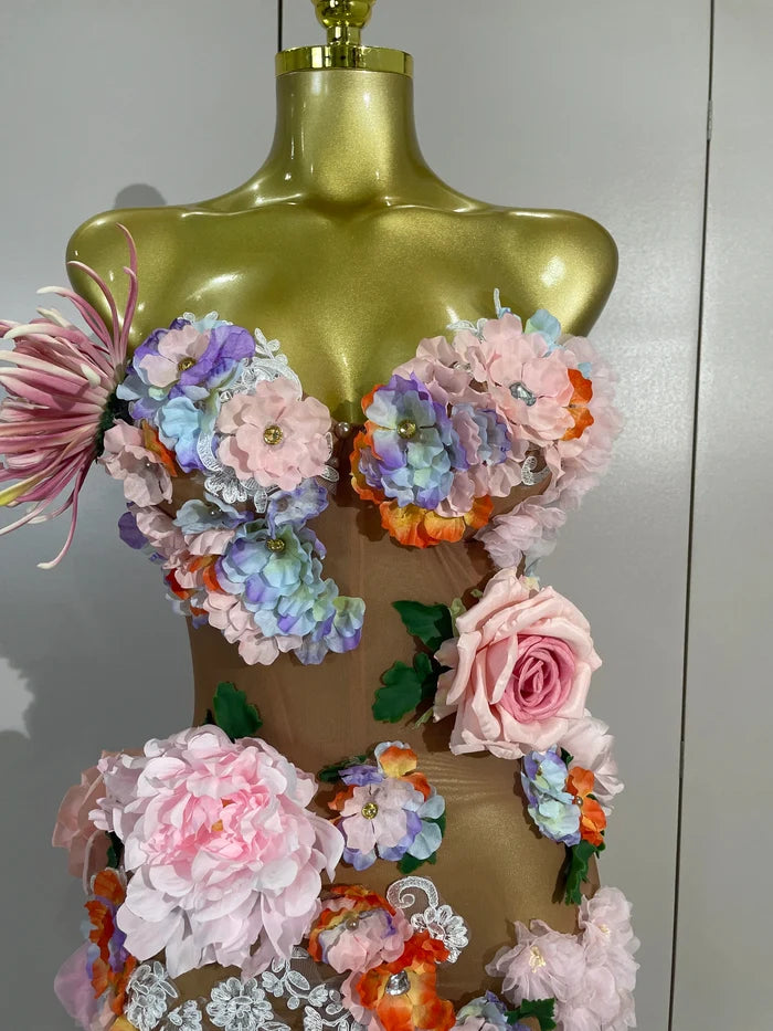 Turn heads in the Zel rhinestone 3D floral tassel mesh mini dress. Elegant bodycon party dress for birthdays, cocktails, and special events.