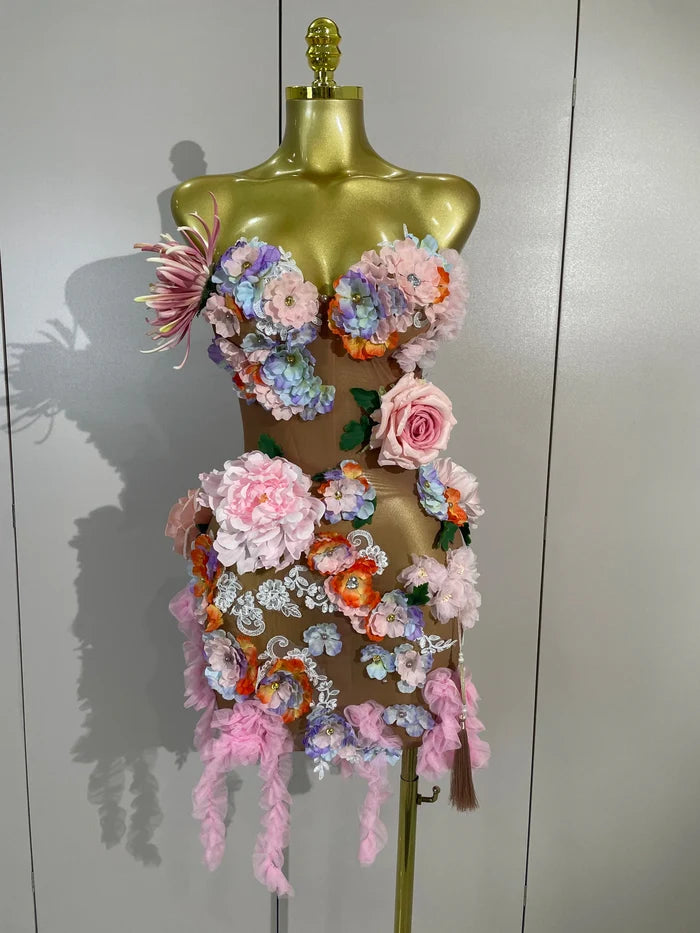 Turn heads in the Zel rhinestone 3D floral tassel mesh mini dress. Elegant bodycon party dress for birthdays, cocktails, and special events.