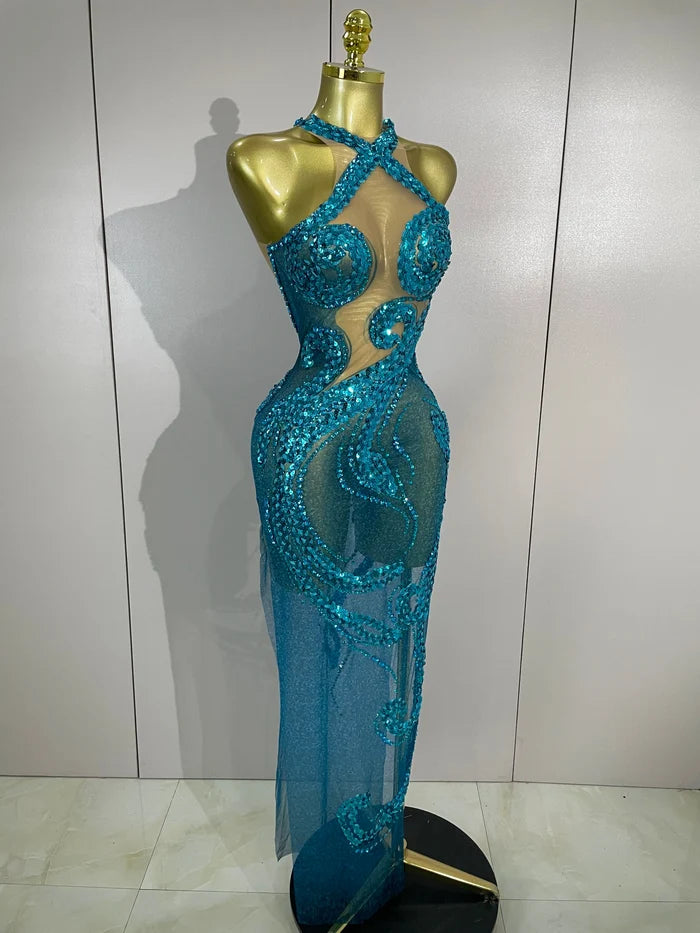 Zuri sleeveless transparent mesh long dress with intricate diamond and sequin patterns for a sparkly luxury evening look.